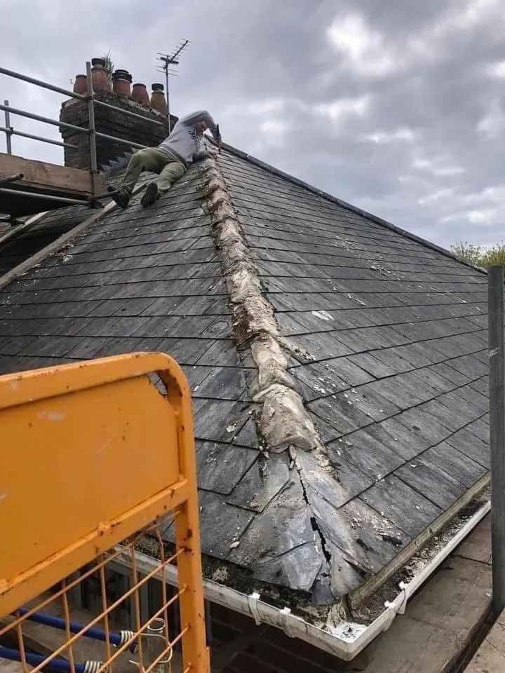 Slate roof ridge and chimney repair in Cullompton